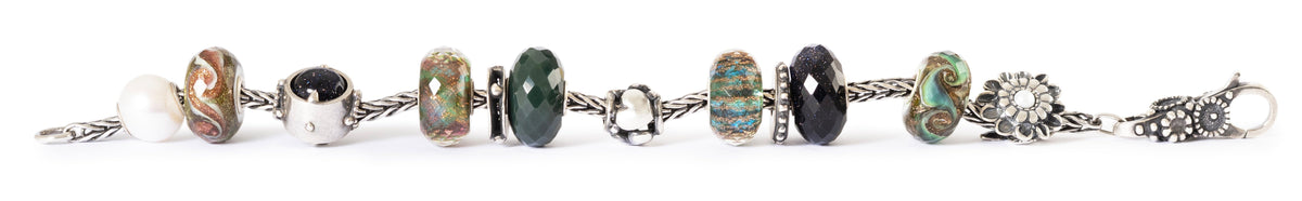 Straight silver foxtail bracelet with winter-inspired glass and silver beads